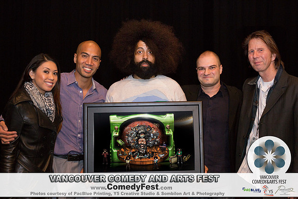 REGGIE WATTS –PASSION CHASER ART PIECE – SIGNING -  VANCOUVER COMEDY and ARTS FEST Art by RON SOMBILON-23-LOGO